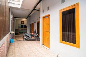 Jotel Guest House Redpartner,Pulauberayan>>Medan,2 star