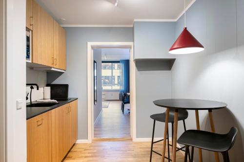 by the lakes apartments into this place