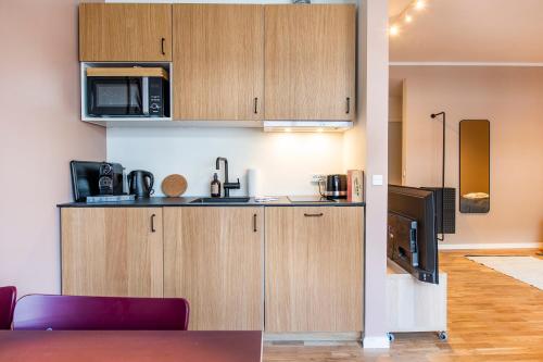 by the lakes apartments into this place