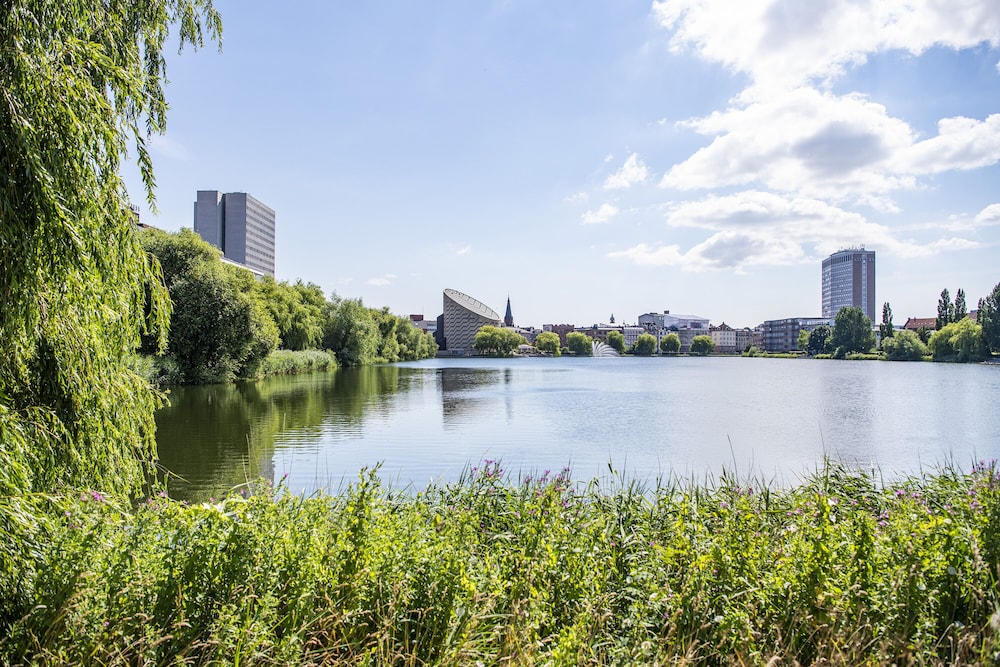 by the lakes apartments into this place