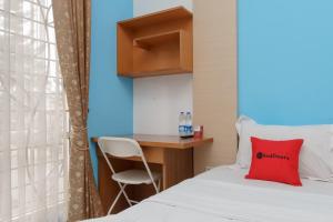 reddoorz syariah plus wisma bougenville karawaci