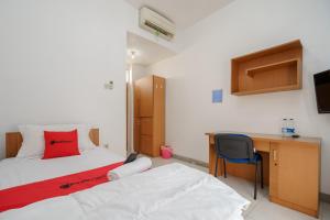 reddoorz syariah plus wisma bougenville karawaci