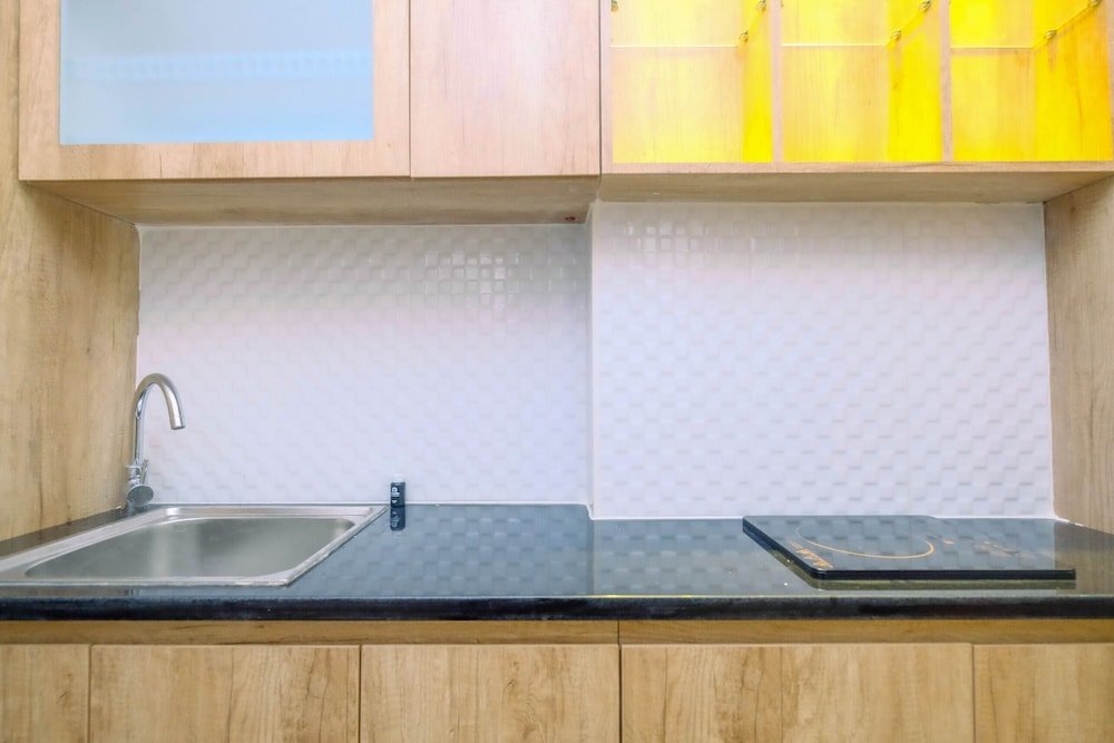 minimalist mustika golf residence studio apartment with city view