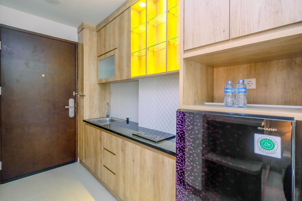 minimalist mustika golf residence studio apartment with city view
