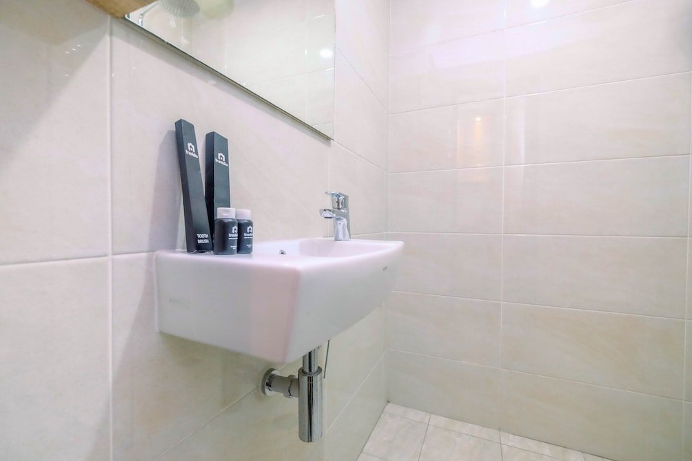 minimalist mustika golf residence studio apartment with city view