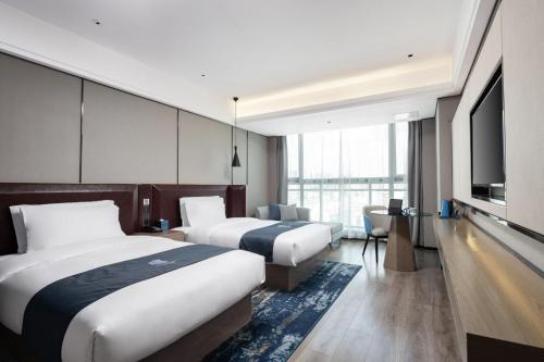 echarm hotel haikou guoxing avenue meiyuan road