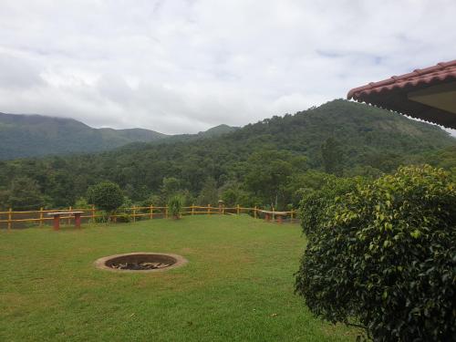 Tropical Blooms Coorg,Kutta>>Kodagu,3 star