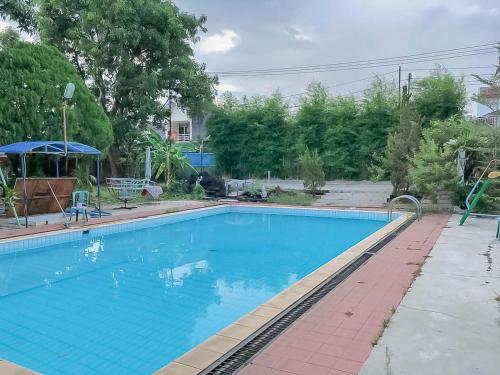 rumah panggung guest house syariah mitra reddoorz