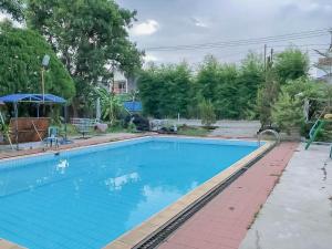 rumah panggung guest house syariah mitra reddoorz