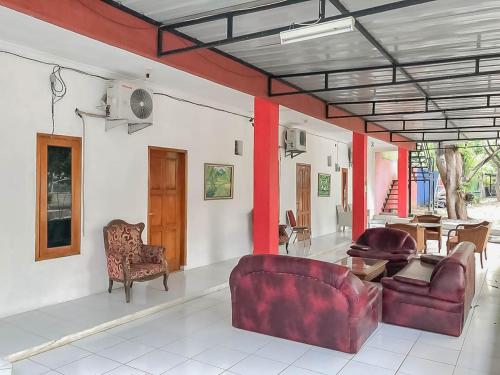 rumah panggung guest house syariah mitra reddoorz