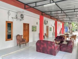rumah panggung guest house syariah mitra reddoorz