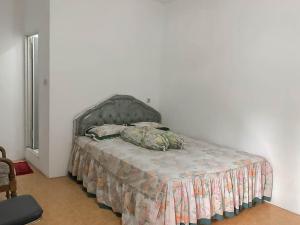 rumah panggung guest house syariah mitra reddoorz