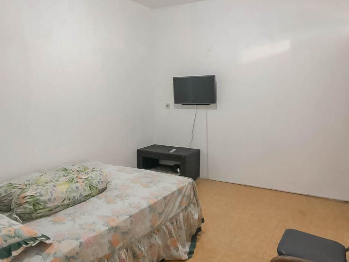 rumah panggung guest house syariah mitra reddoorz