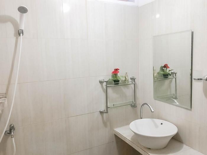rumah panggung guest house syariah mitra reddoorz