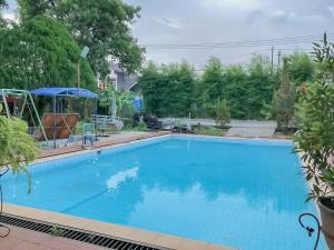 rumah panggung guest house syariah mitra reddoorz
