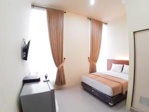 Reddoorz Syariah Near Transmart Jambi 2,Tanjung Johor>>Jambi,2 star