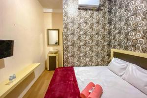 tinis guest house malang redpartner