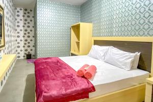 tinis guest house malang redpartner