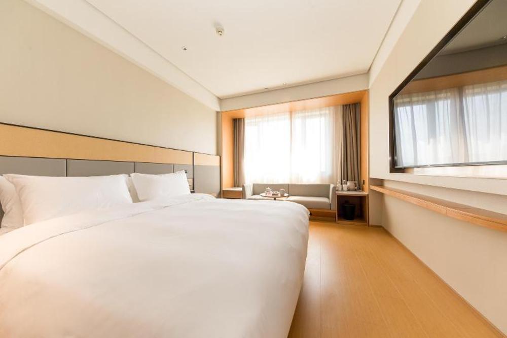ji hotel hangzhou zhuantang academy of fine arts b