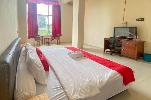 reddoorz near universitas merdeka malang 2