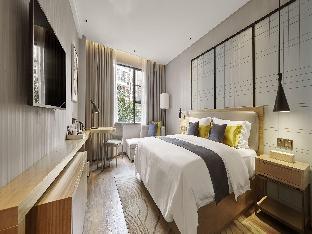 echarm hotel qionghai wanquan river