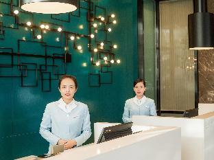 echarm hotel qionghai wanquan river