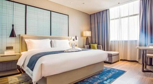 echarm hotel qionghai wanquan river