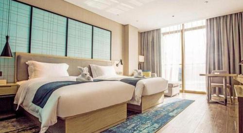 echarm hotel qionghai wanquan river