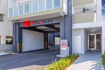 mr kinjo inn in front of children medical care center