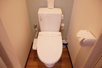 mr kinjo inn in front of children medical care center