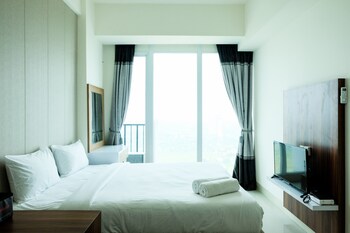 homey studio room tree park apartment near bsd city