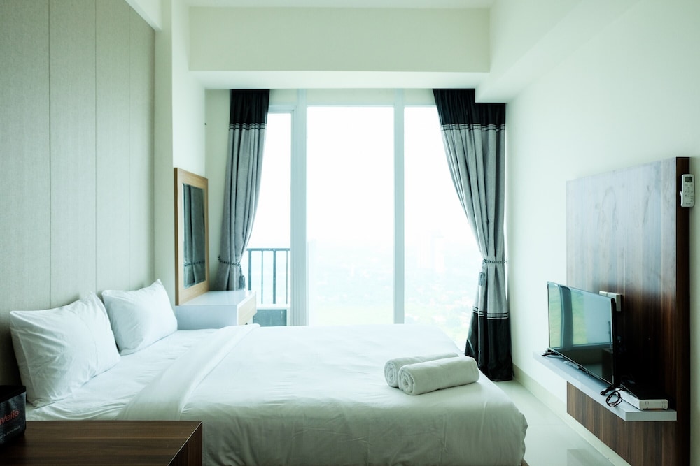 homey studio room tree park apartment near bsd city