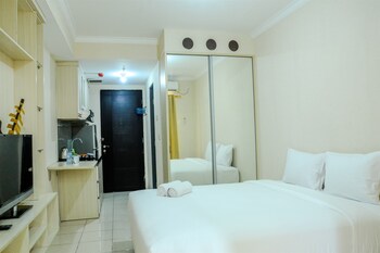 simply studio room at grand serpong apartment by travelio