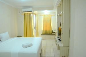 simply studio room at grand serpong apartment by travelio