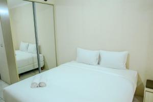simply studio room at grand serpong apartment by travelio