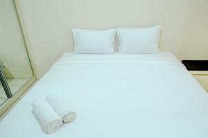 simply studio room at grand serpong apartment by travelio