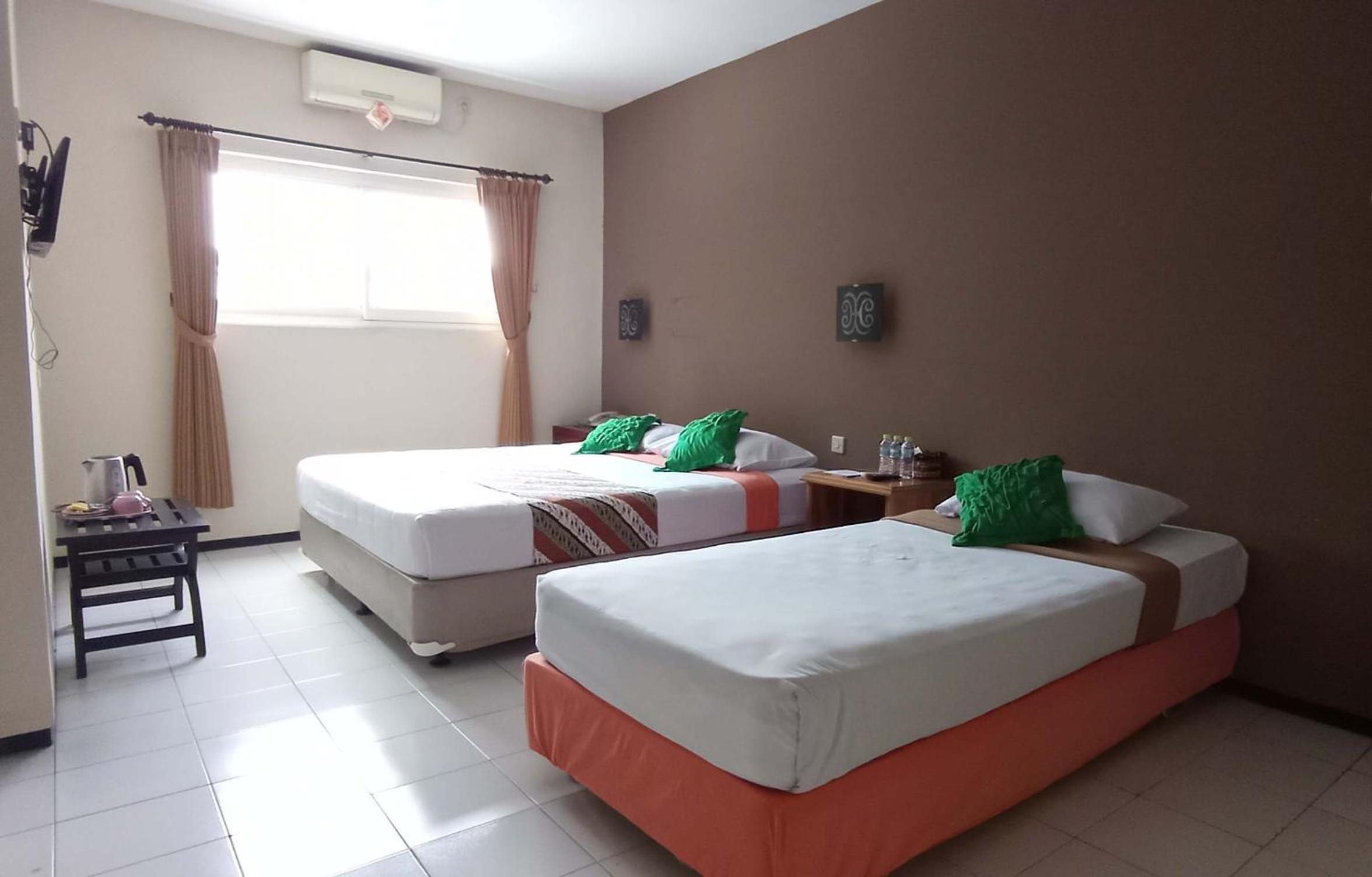 helios hotel malang