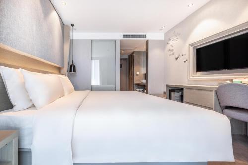 orange hotel select hangzhou jiangnan avenue longhu paradise walk