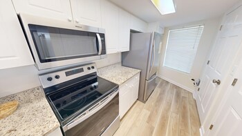 recently renovated 2 bedroom short walk to the beach condo