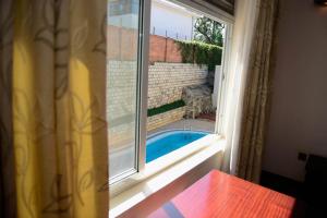 Room In Apartment - Nobilis Standard Suite Located In A Wonderful Location For A Great Experience,Rwanda>>Kigali,3 star