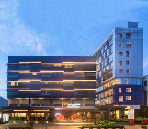 swiss belinn wahid hasyim