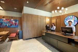 swiss belinn wahid hasyim