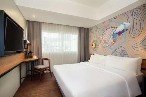 swiss belinn wahid hasyim