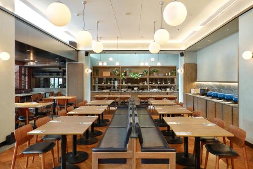 swiss belinn wahid hasyim