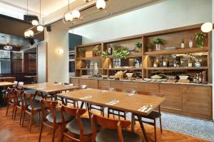 swiss belinn wahid hasyim