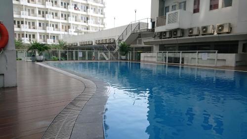 sentul tower apartment by kozy room