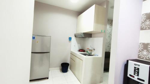 sentul tower apartment by kozy room