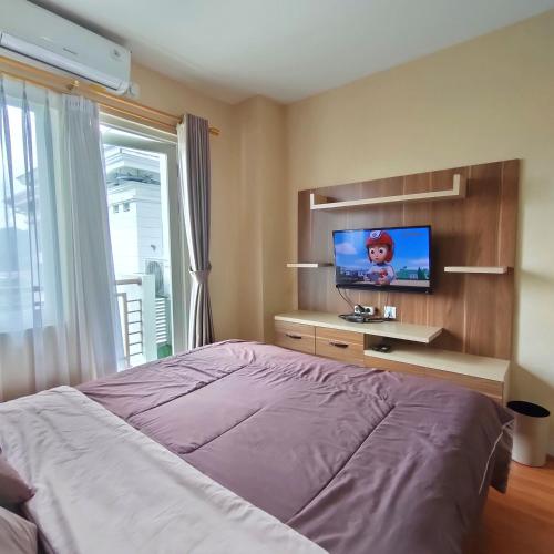 sentul tower apartment by kozy room