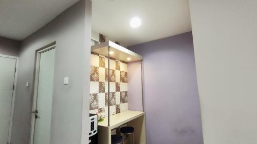sentul tower apartment by kozy room