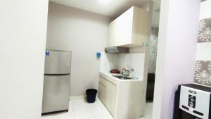 sentul tower apartment by kozy room